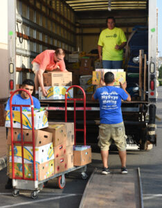 2 movers loading with rotarians