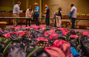 backpacks being filled