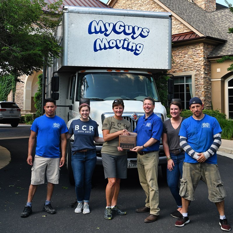 Movers accepting Champion award