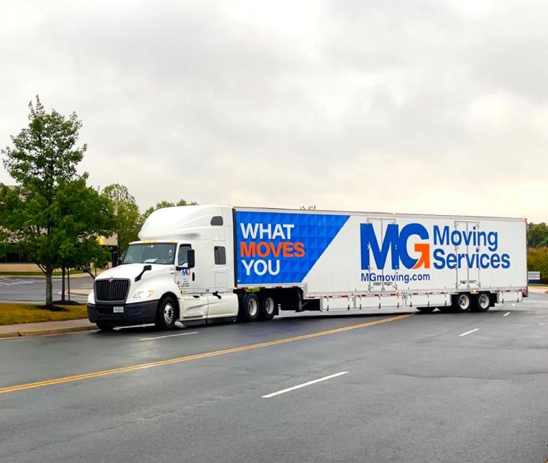 Leesburg VA Movers Making A Turn In An MG Moving Truck
